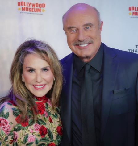 Debbie Higgins ex-husband Phil McGraw with his wife Robin McGraw
